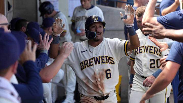 Mar 9, 2026; Phoenix, Arizona, USA; Milwaukee Brewers second baseman David Hamilton (6) celebrates with teammates after scoring a run against the Los Angeles Dodgers in the second inning at American Family Fields of Phoenix. Mandatory Credit: Rick Scuteri-Imagn Images