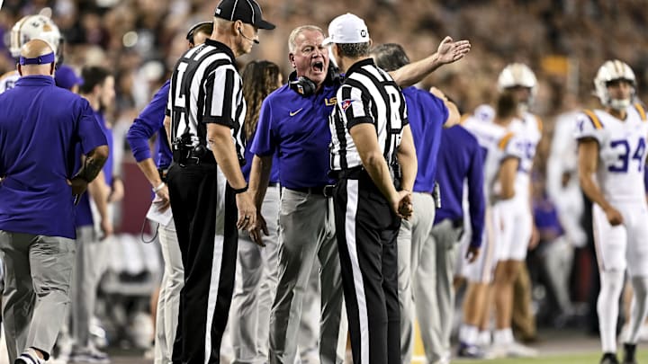 Oct 26, 2024; College Station, Texas, USA; LSU Tigers head coach Brian Kelly speaks with the officials during a time out in the second quarter against the LSU Tigers at Kyle Field. Mandatory Credit: Maria Lysaker-Imagn Images. Oct 26, 2024; College Station, Texas, USA; LSU Tigers head coach Brian Kelly speaks with the officials during a time out in the second quarter against the LSU Tigers at Kyle Field. Mandatory Credit: Maria Lysaker-Imagn Images.