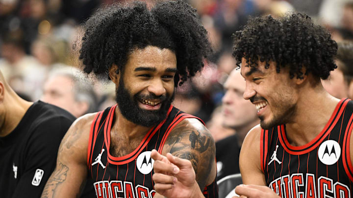 Jan 20, 2026; Chicago, Illinois, USA; Chicago Bulls guard Coby White (0), left, laughs with  guard Tre Jones (30) on the bench during the second half against the LA Clippers at United Center. Mandatory Credit: Matt Marton-Imagn Images