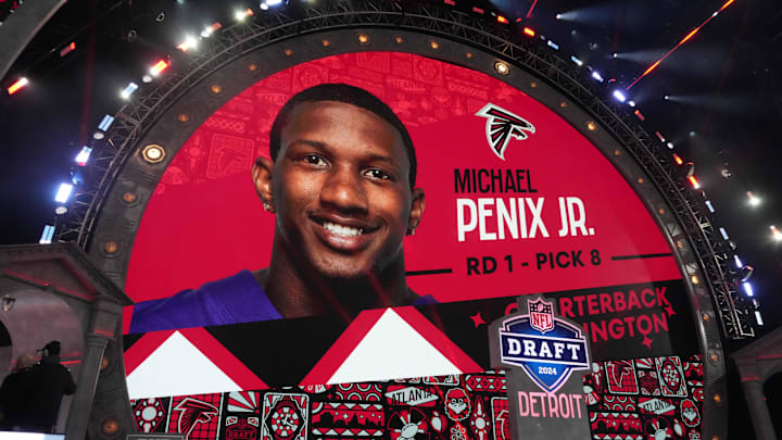 Apr 25, 2024; Detroit, MI, USA; Washington Huskies quarterback Michael Penix Jr. is selected as the No. 8 pick in the first round by Atlanta Falcons during the 2024 NFL Draft at Campus Martius Park and Hart Plaza. Mandatory Credit: Kirby Lee-Imagn Images