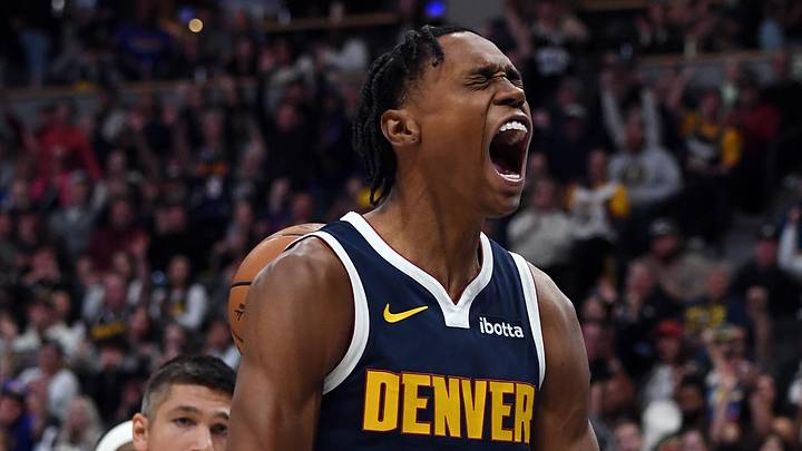 Oct 25, 2025; Denver, Colorado, USA; Denver Nuggets guard Peyton Watson (8) celebrates after dunking the ball against Phoenix Suns center Khaman Maluach (10) during the first half at Ball Arena. Mandatory Credit: Christopher Hanewinckel-Imagn Images