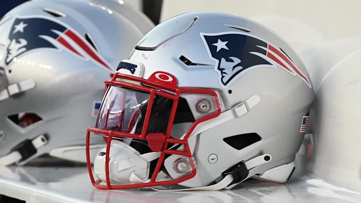 Aug 19, 2022; Foxborough, Massachusetts, USA; A Patriots helmet sits on the bench before the first half of a preseason game against the Carolina Panthers at Gillette Stadium. Mandatory Credit: Eric Canha-Imagn Images