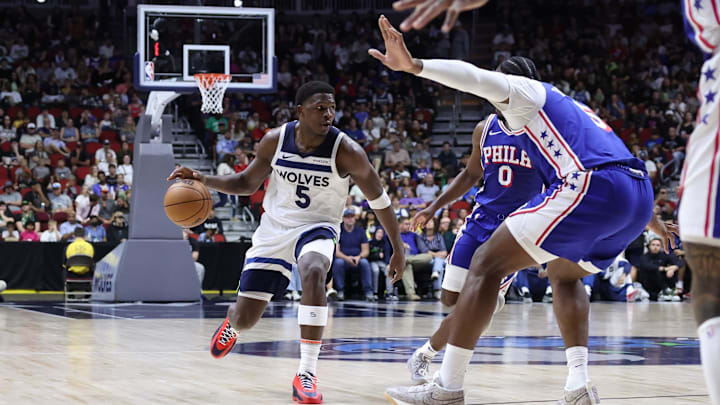 Oct 11, 2024; Des Moines, Iowa, USA; Minnesota Timberwolves guard Anthony Edwards (5) sets the offense against the Philadelphia 76ers at Wells Fargo Arena. The Timberwolves beat the 76ers 121 to 111. Mandatory Credit: Reese Strickland-Imagn Images Oct 11, 2024; Des Moines, Iowa, USA; Minnesota Timberwolves guard Anthony Edwards (5) sets the offense against the Philadelphia 76ers at Wells Fargo Arena. The Timberwolves beat the 76ers 121 to 111. Mandatory Credit: Reese Strickland-Imagn Images