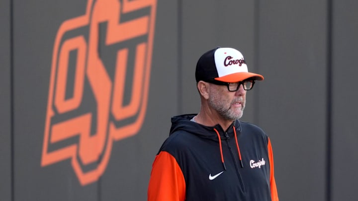 Oklahoma State coach Kenny Gajewski watches during an NCAA softball game between the Oklahoma State University Cowgirls (OSU) and the Utah Utes in Stillwater, Okla., Friday, May 2, 2025.