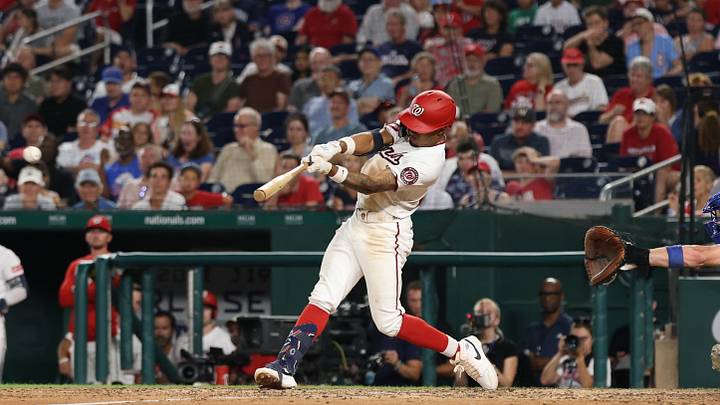 Aug 11, 2026; Washington, District of Columbia, USA; Washington Nationals second baseman Nasim Nuñez (26) hits an RBI single against the Chicago Cubs during the eighth inning at Nationals Park. Mandatory Credit: Geoff Burke-Imagn Images