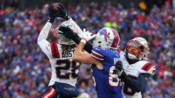 New England Patriots CB Alex Austin (28) intercepts a pass intended for Bills TE Dawson Knox.