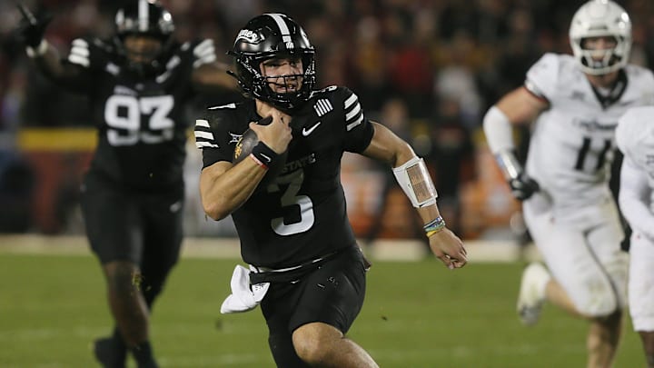 Rocco Becht runs for Iowa State against Cincinnati Saturday night in Ames. Rocco Becht runs for Iowa State against Cincinnati Saturday night in Ames.