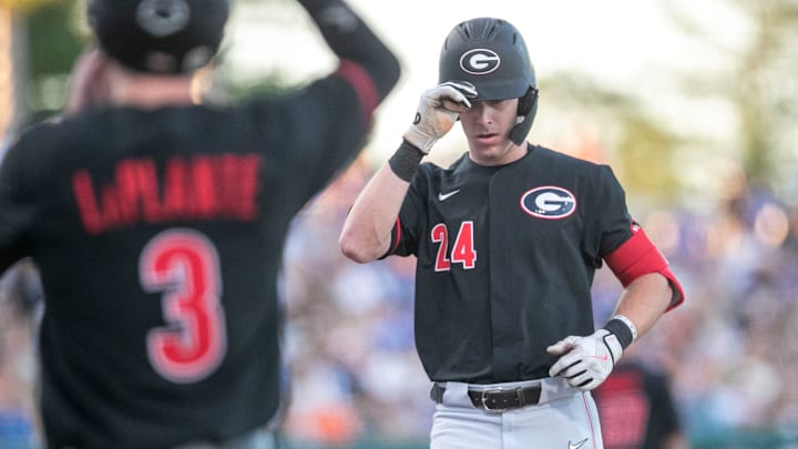 Georgia's first baseman Charlie Condon (24) with a home run on the Gators, Friday, April 14, 2023,