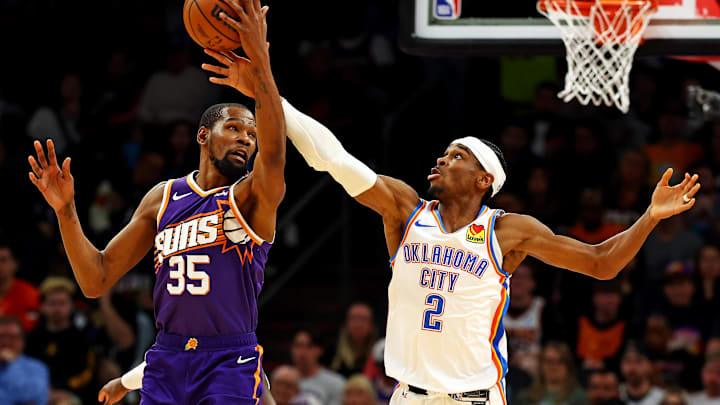 Mar 3, 2024; Phoenix, Arizona, USA; Phoenix Suns forward Kevin Durant (35) and Oklahoma City Thunder guard Shai Gilgeous-Alexander (2) go for the ball during the second quarter at Footprint Center. Mandatory Credit: Mark J. Rebilas-Imagn Images Mar 3, 2024; Phoenix, Arizona, USA; Phoenix Suns forward Kevin Durant (35) and Oklahoma City Thunder guard Shai Gilgeous-Alexander (2) go for the ball during the second quarter at Footprint Center. Mandatory Credit: Mark J. Rebilas-Imagn Images