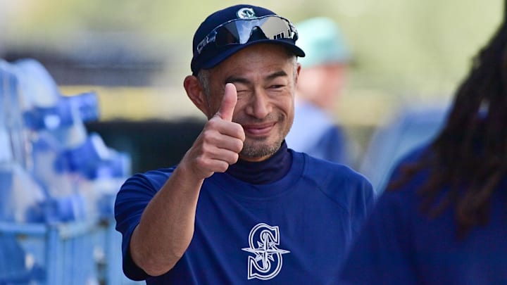 Former Seattle Mariners player Ichiro Suzuki reacts during a Spring Training workout on Feb. 15 at Peoria Sports Complex.