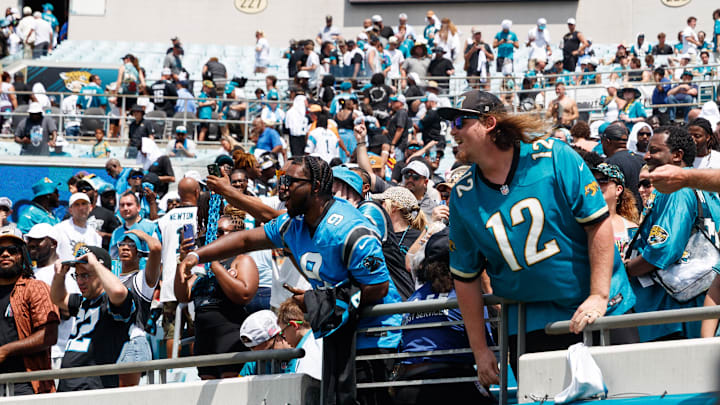 Sep 7, 2025; Jacksonville, Florida, USA; Jacksonville Jaguars fans and Carolina Panthers fans cheering during the game at EverBank Stadium. Mandatory Credit: Morgan Tencza-Imagn Images