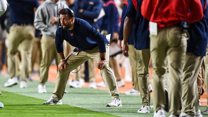 Oct 16, 2021; Knoxville, Tennessee, USA; Mississippi Rebels assistant coach Coleman Hutzler coaching during the first half against the Tennessee Volunteers at Neyland Stadium. Mandatory Credit: Bryan Lynn-Imagn Images