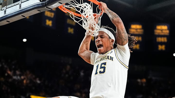 Michigan guard Rubin Jones (15) celebrates a dunk against Purdue during the first half at Crisler Center in Ann Arbor on Tuesday, Feb. 11, 2025.