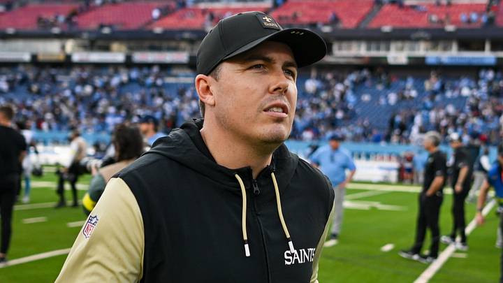 Dec 28, 2025; Nashville, Tennessee, USA;  New Orleans Saints head coach Kellen Moore leaves the field against the Tennessee Titans during the second half at Nissan Stadium. Mandatory Credit: Steve Roberts-Imagn Images