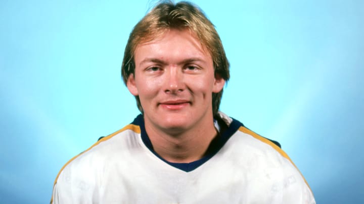 A young Lindy Ruff smiling as a member of the Buffalo Sabres A young Lindy Ruff smiling as a member of the Buffalo Sabres