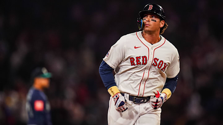 Apr 22, 2025; Boston, Massachusetts, USA; Boston Red Sox first base Triston Casas (36) hits a three run home run against the Seattle Mariners in the seventh inning at Fenway Park. Mandatory Credit: David Butler II-Imagn Images