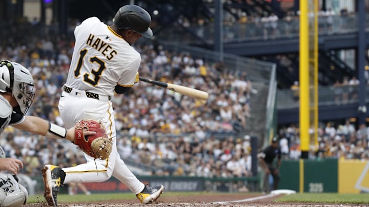 Jul 19, 2025; Pittsburgh, Pennsylvania, USA; Pittsburgh Pirates third baseman Ke'Bryan Hayes (13) hits a two run double against theChicago White Sox during the fourth inning at PNC Park. Mandatory Credit: Charles LeClaire-Imagn Images Jul 19, 2025; Pittsburgh, Pennsylvania, USA; Pittsburgh Pirates third baseman Ke'Bryan Hayes (13) hits a two run double against theChicago White Sox during the fourth inning at PNC Park. Mandatory Credit: Charles LeClaire-Imagn Images