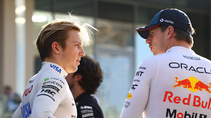  Liam Lawson of New Zealand and Visa Cash App RB talks to Max Verstappen of the Netherlands and Oracle Red Bull Racing prior to the F1 Grand Prix of Abu Dhabi at Yas Marina Circuit on December 08, 2024 in Abu Dhabi, United Arab Emirates. (Photo by Mark Thompson/Getty Images)