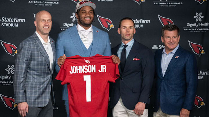 Paris Johnson Jr. (second from left) with general manager Monti Ossenfort (left), head coach Paris Johnson Jr. (second from left) with general manager Monti Ossenfort (left), head coach