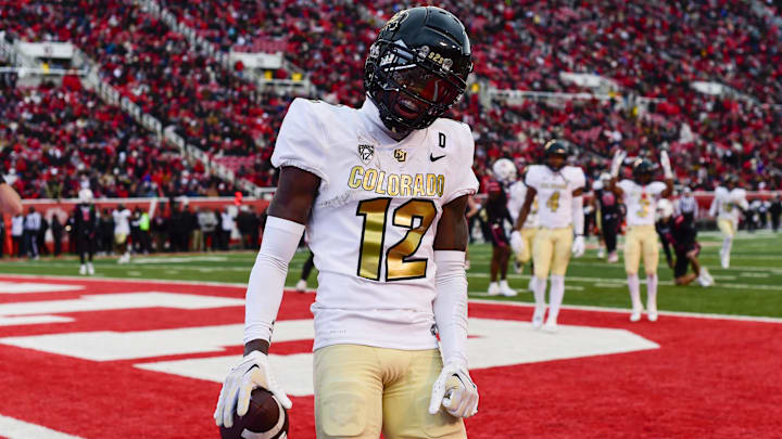 Colorado Buffaloes athlete Travis Hunter reacts after scoring a touchdown against the Utah Utes.
