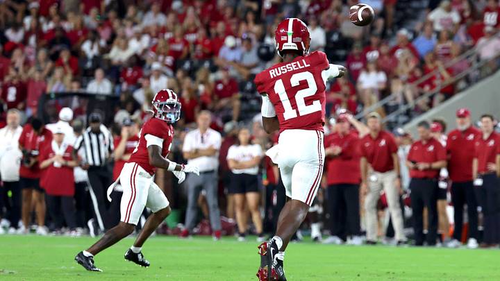 Sep 6, 2025; Tuscaloosa, Alabama, USA; Alabama Crimson Tide quarterback Keelon Russell (12) throws a pass to wide receiver Jaylen Mbakwe (3) during the second half against the Louisiana Monroe Warhawks at Saban Field at Bryant-Denny Stadium. Mandatory Credit: David Leong-Imagn Images