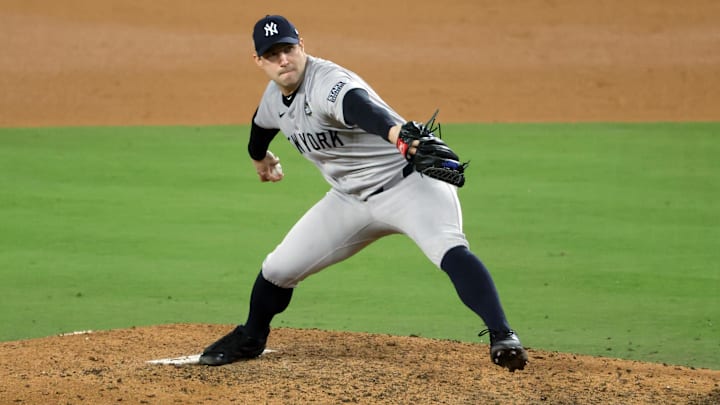 Oct 25, 2024; Los Angeles, California, USA; New York Yankees pitcher Tommy Kahnle (41) pitches in the seventh inning against the Los Angeles Dodgers during game one of the 2024 MLB World Series at Dodger Stadium. Mandatory Credit: Kiyoshi Mio-Imagn Images