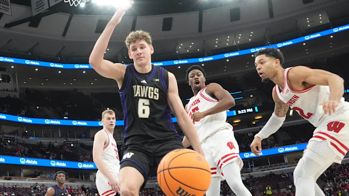 Mar 12, 2026; Chicago, IL, USA; Washington Huskies forward Hannes Steinbach (6) and Wisconsin Badgers guard Nick Boyd (2) go for the ball during the second half at United Center. Mandatory Credit: David Banks-Imagn Images Mar 12, 2026; Chicago, IL, USA; Washington Huskies forward Hannes Steinbach (6) and Wisconsin Badgers guard Nick Boyd (2) go for the ball during the second half at United Center. Mandatory Credit: David Banks-Imagn Images