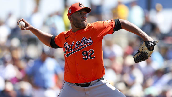 Mar 15, 2024; Port Charlotte, Florida, USA;  Baltimore Orioles pitcher Albert Suarez (92) throws