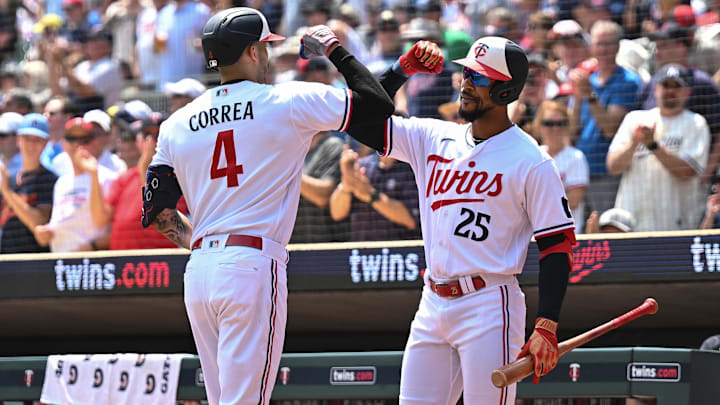 Jun 22, 2023; Minneapolis, Minnesota, USA; Minnesota Twins shortstop Carlos Correa (4) reacts with designated hitter Byron Buxton (25) after hitting a home run off Boston Red Sox starting pitcher Justin Garza (63) during the first inning at Target Field.
