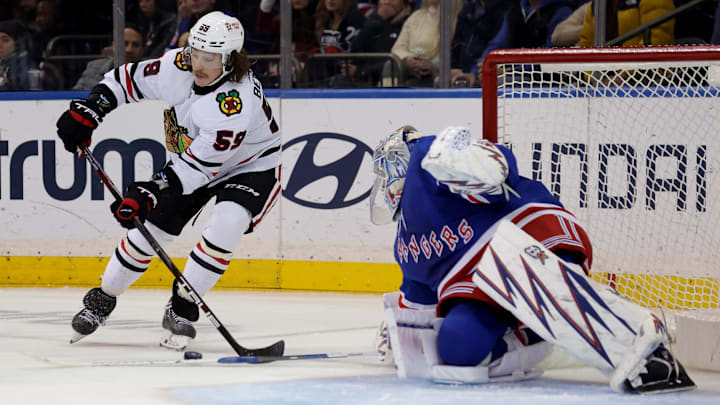 Dec 9, 2024; New York, New York, USA; Chicago Blackhawks left wing Tyler Bertuzzi (59) skates with the puck against New York Rangers goaltender Igor Shesterkin (31) during the second period at Madison Square Garden. Mandatory Credit: Brad Penner-Imagn Images