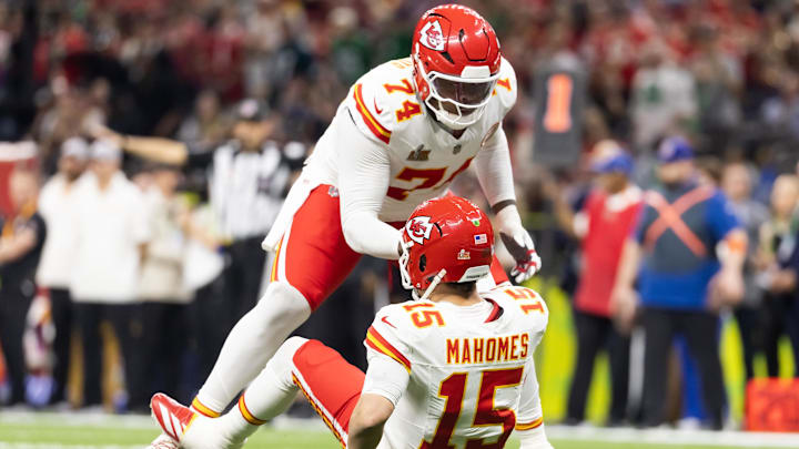 Feb 9, 2025; New Orleans, LA, USA; Kansas City Chiefs offensive tackle Jawaan Taylor (74) helps up quarterback Patrick Mahomes (15) against the Philadelphia Eagles in Super Bowl LIX at Ceasars Superdome. Mandatory Credit: Mark J. Rebilas-Imagn Images Feb 9, 2025; New Orleans, LA, USA; Kansas City Chiefs offensive tackle Jawaan Taylor (74) helps up quarterback Patrick Mahomes (15) against the Philadelphia Eagles in Super Bowl LIX at Ceasars Superdome. Mandatory Credit: Mark J. Rebilas-Imagn Images