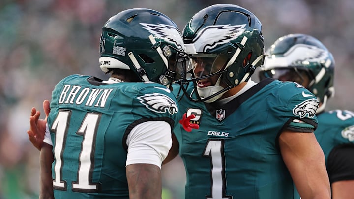 Jan 26, 2025; Philadelphia, PA, USA; Philadelphia Eagles quarterback Jalen Hurts (1) and wide receiver A.J. Brown (11) celebrate after a touchdown against the Washington Commanders during the first half in the NFC Championship game at Lincoln Financial Field. Mandatory Credit: Bill Streicher-Imagn Images