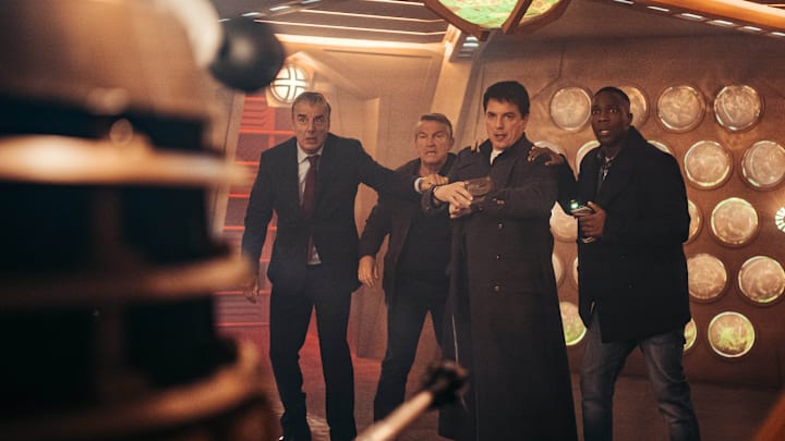 John Barrowman as Captain Jack Harkness, Bradley Walsh as Graham, Tosin Cole as Ryan, Chris Noth as Robertson, Daleks - Doctor Who Special 2020: Revolution Of The Daleks - Photo Credit: James Pardon/BBC Studios/BBCA