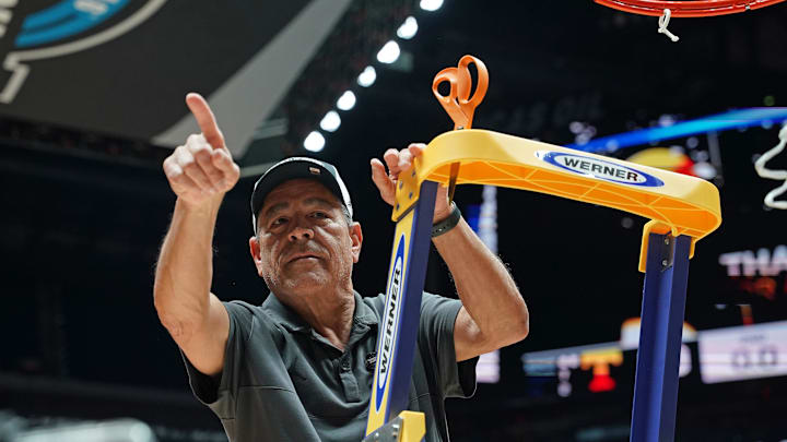 Houston Cougars basketball coach Kelvin Sampson reacts after cutting the net for the Midwest Regional final of the 2025 NCAA tournament at Lucas Oil Stadium. Houston Cougars basketball coach Kelvin Sampson reacts after cutting the net for the Midwest Regional final of the 2025 NCAA tournament at Lucas Oil Stadium.