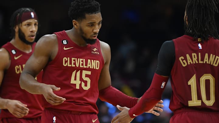 Dec 2, 2022; Cleveland, Ohio, USA; Cleveland Cavaliers guard Donovan Mitchell (45) celebrates with guard Darius Garland (10) during the second half against the Orlando Magic at Rocket Mortgage FieldHouse. Mandatory Credit: Ken Blaze-USA TODAY Sports