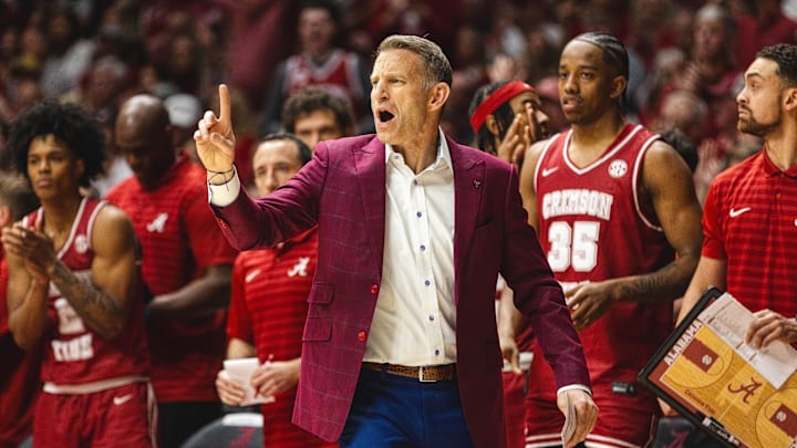 Feb 15, 2025; Tuscaloosa, Alabama, USA; Alabama Crimson Tide head coach Nate Oats directs his team against the Auburn Tigers during the first half at Coleman Coliseum. Mandatory Credit: Will McLelland-Imagn Images
