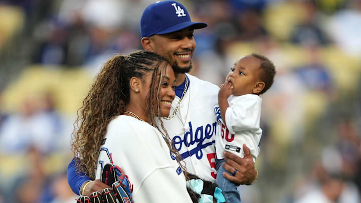 Los Angeles Dodgers shortstop Mookie Betts (50) poses with son Kaj Betts, wife Brianna Hammonds and daughter Kynlee Betts before the game against the Arizona Diamondbacks at Dodger Stadium.