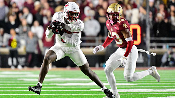 Oct 25, 2024; Chestnut Hill, Massachusetts, USA; Louisville Cardinals wide receiver Chris Bell (0) runs after making a catch against the Boston College Eagles during the first half at Alumni Stadium. Mandatory Credit: Eric Canha-Imagn Images