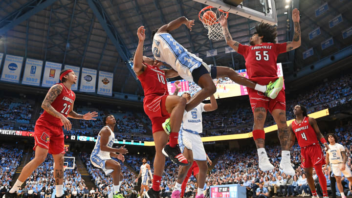 Jan 17, 2024; Chapel Hill, North Carolina, USA;  Louisville guard Skyy Clark (55) guards North Carolina forward Jae'Lyn Withers (21).