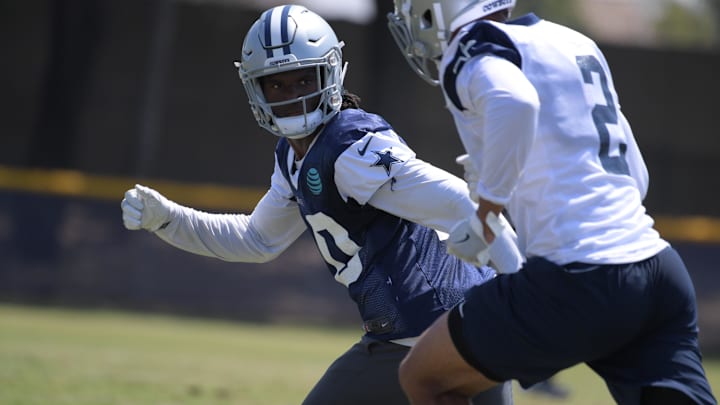 Dallas Cowboys defensive back Charvarius Ward defends against receiver Ricky Jeune during training camp.