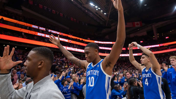 Dec 7, 2024; Seattle, Washington, USA;  Kentucky Wildcats forward Brandon Garrison (10) and guard Koby Brea (4) celebrate after a game against the Gonzaga Bulldogs at Climate Pledge Arena. Mandatory Credit: Stephen Brashear-Imagn Images