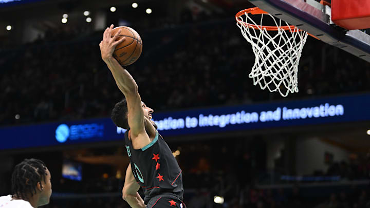 Washington Wizards guard Landry Shamet (20) dunks the ball against the Toronto Raptors during the first half at Capital One Arena. 