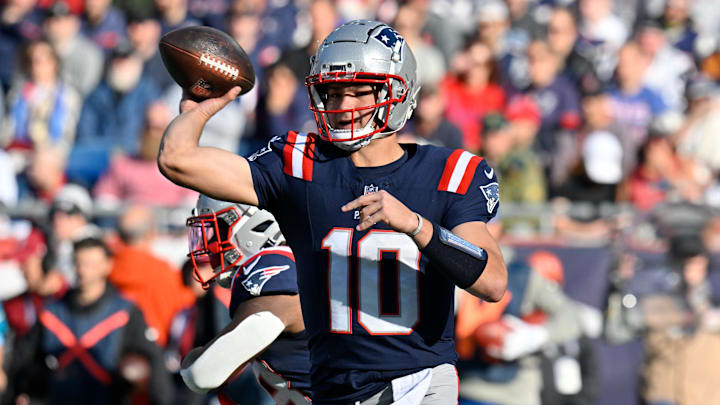 Nov 17, 2024; Foxborough, Massachusetts, USA;  New England Patriots quarterback Drake Maye (10) throws a pass during the first half against the Los Angeles Rams at Gillette Stadium.