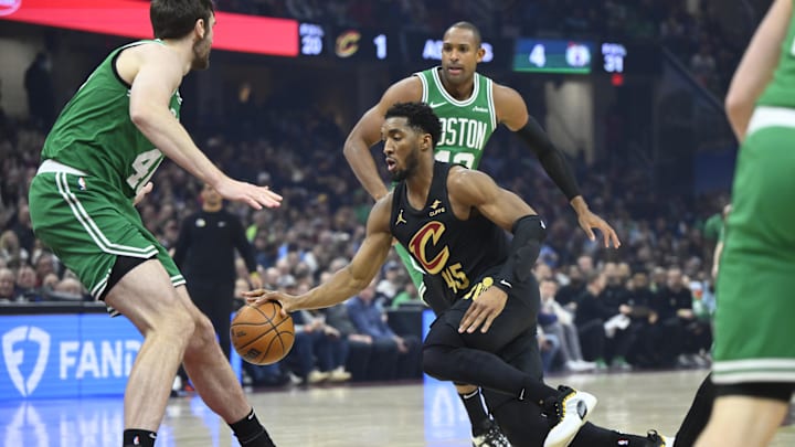 Feb 4, 2025; Cleveland, Ohio, USA; Cleveland Cavaliers guard Donovan Mitchell (45) dribbles in the first quarter against the Boston Celtics at Rocket Mortgage FieldHouse. Mandatory Credit: David Richard-Imagn Images Feb 4, 2025; Cleveland, Ohio, USA; Cleveland Cavaliers guard Donovan Mitchell (45) dribbles in the first quarter against the Boston Celtics at Rocket Mortgage FieldHouse. Mandatory Credit: David Richard-Imagn Images