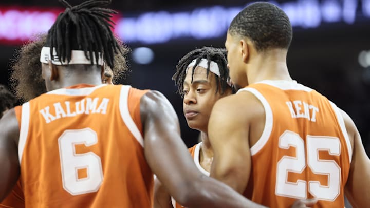 Feb 26, 2025; Fayetteville, Arkansas, USA; Texas Longhorns guard Tre Johnson huddles with his team during the first half against the Arkansas Razorbacks at Bud Walton Arena. Mandatory Credit: Nelson Chenault-Imagn Images