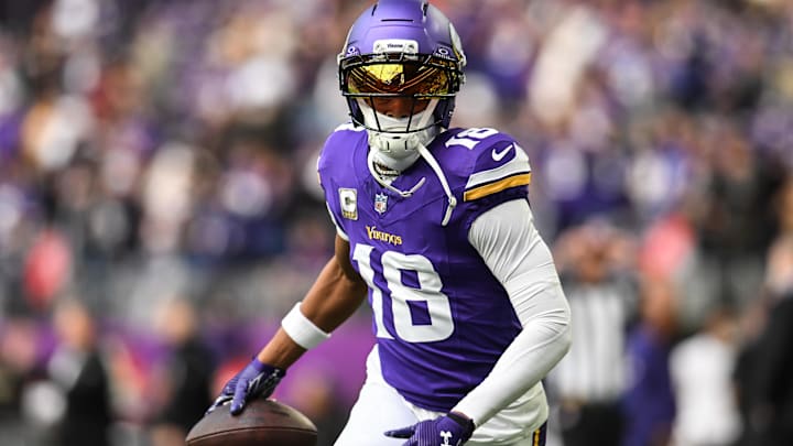 Nov 9, 2025; Minneapolis, Minnesota, USA; Minnesota Vikings wide receiver Justin Jefferson (18) warms up before the game against the Baltimore Ravens at U.S. Bank Stadium. 