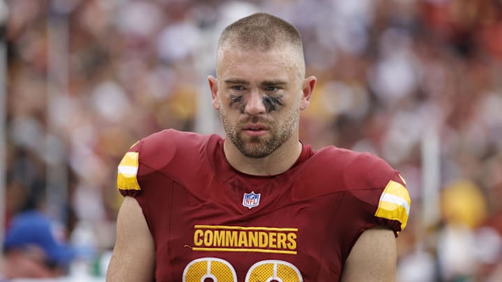 Washington Commanders tight end Zach Ertz (86) walks off the field after the game against the Las Vegas Raiders at Northwest Stadium. 