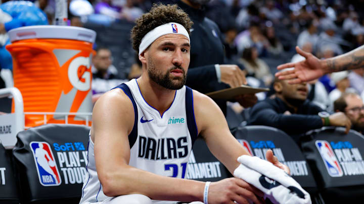 Apr 16, 2025; Sacramento, California, USA; Dallas Mavericks guard Klay Thompson (31) sits on the bench during the fourth quarter against the Sacramento Kings at Golden 1 Center. Apr 16, 2025; Sacramento, California, USA; Dallas Mavericks guard Klay Thompson (31) sits on the bench during the fourth quarter against the Sacramento Kings at Golden 1 Center.