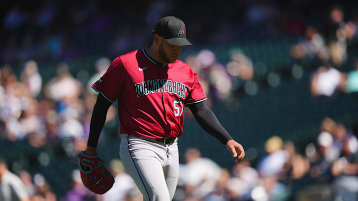 Sep 18, 2024; Denver, Colorado, USA; Arizona Diamondbacks pitcher Jordan Montgomery (52) reacts in the fourth inning against the Colorado Rockies at Coors Field. Mandatory Credit: Ron Chenoy-Imagn Images