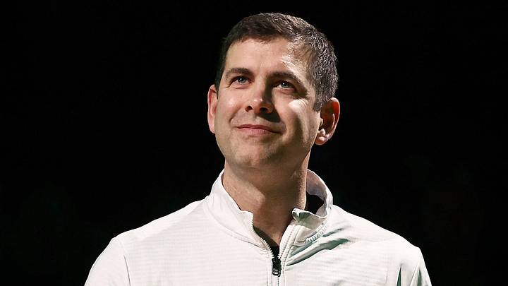 Feb 11, 2026; Boston, Massachusetts, USA; Brad Stevens the president of basketball operations for the Boston Celtics smiles during a ceremony guard Jaylen Brown (7) for receiving the NBA player of the month award for his performance in the month of January before their game against the Chicago Bulls at TD Garden. Mandatory Credit: Winslow Townson-Imagn Images